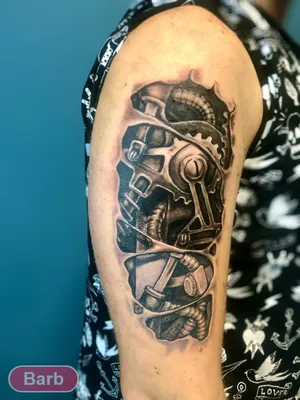 Realistic shock absorber biomechanical lower leg piece. Tattoo by Jurgis  Mikalauskas, an artist bas… | Biomechanical tattoo, Biomechanical tattoo  design, 3d tattoos