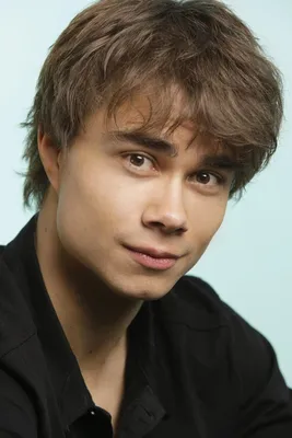 Portrait of alexander rybak relaxing in a chair on Craiyon