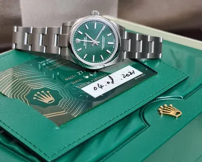 Швейцарские часы Rolex Oyster Perpetual Green Dial 31mm (7700) купить в  Москве, узнать цену в каталоге ломбарда на Сретенке