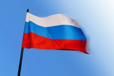 Флаг России с гербом и надписью \"Россия\"