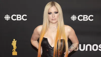 How Avril Lavigne went from punk rocker to luxury fashion fixture: when  Tyga's new girlfriend showed up for Louboutin and Lanvin at Paris Fashion  Week, the millennial pop icon entered a new