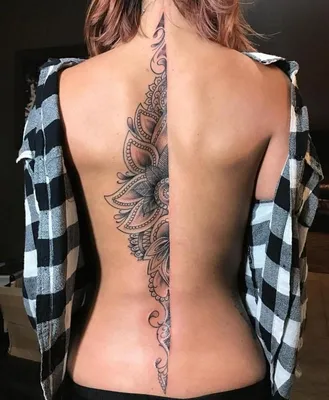 Девушка с татуировкой на спине Stock Photo | Adobe Stock