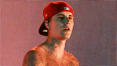 Justin Bieber Strolls Through N.Y.C. with Shirt Tied Over His Head