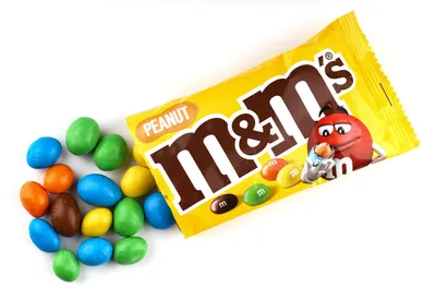 KHARKIV, UKRAINE - JANUARY 2, 2021 M and Ms colorful button shaped  chocolate candies. Multi colored chocolates each of which has the letter m  printed in lower case in white 33853897 Stock Photo at Vecteezy