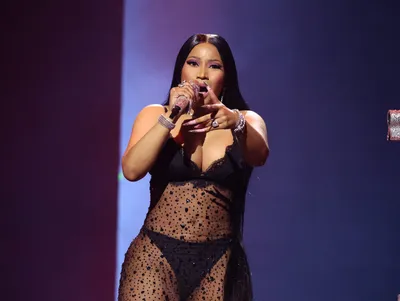 Nicki Minaj Reasserts Queen Status With 'Pink Friday 2' Cover Art | HipHopDX