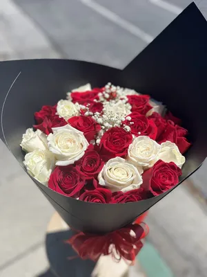 a bundle of flowers and a card saying I love you Stock Photo - Alamy