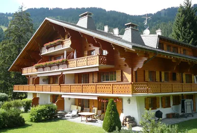 Photo of a chalet in the snowy swiss alps on Craiyon