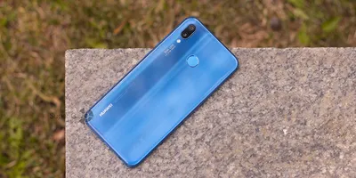 Фото Huawei P20 Lite в формате JPG для широкой поддержки устройств