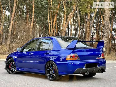 Обои для рабочего стола Mitsubishi Lancer Evolution 9: добавь элегантности в свою работу